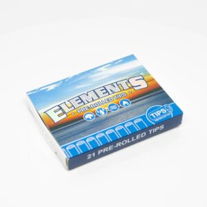 a box of cigarettes sitting on top of a white table