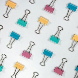 a group of clips with a paper clip attached to them